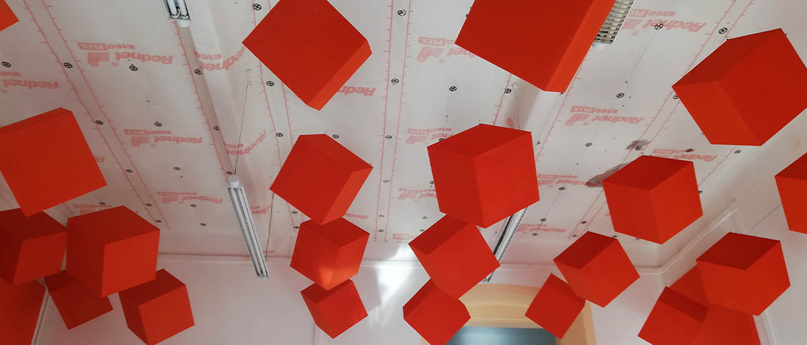 Alea-baffles-sound-absorbing-scattered-orange-cubes