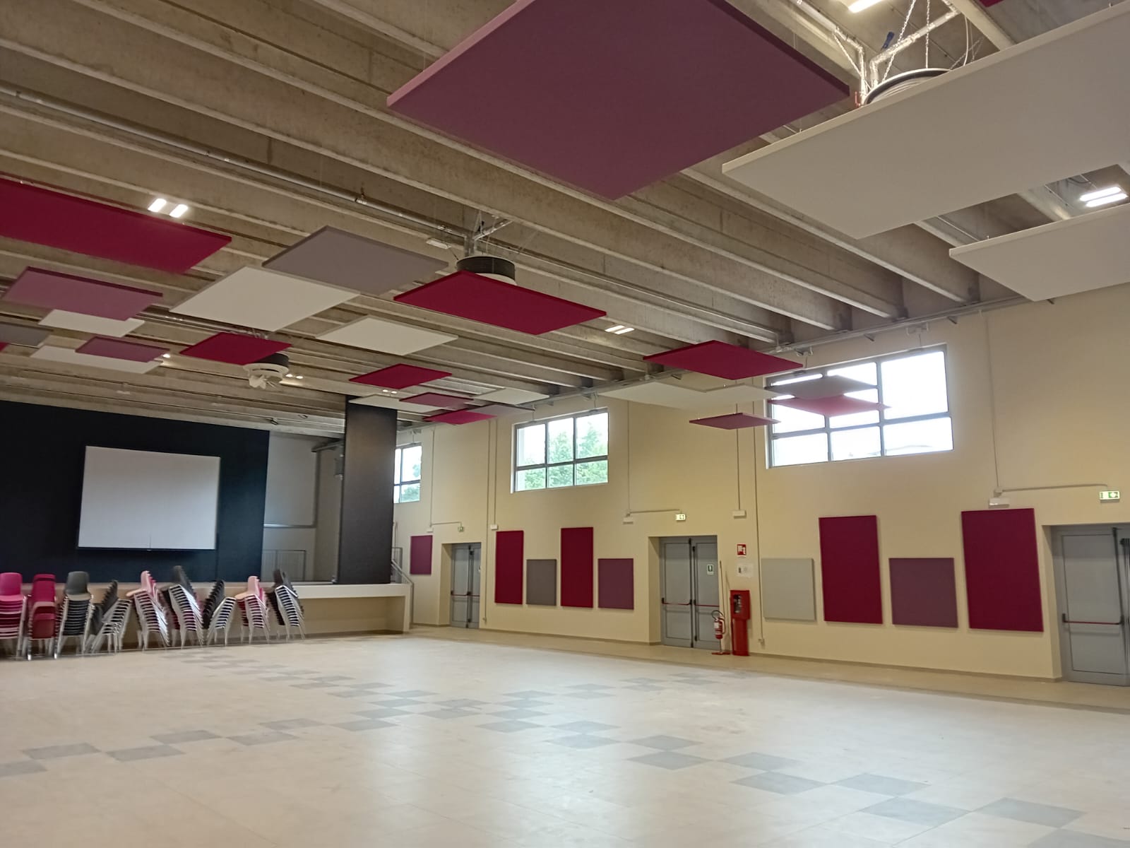 Auditorium-acoustic-treatment-colored-sound-absorbing-panels